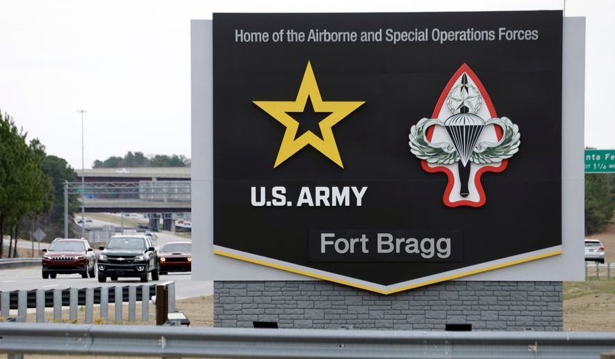 A sign for Fort Bragg is seen, March 7, 2025, in Fort Bragg, N.C. (AP Photo/Chris Seward, File)
