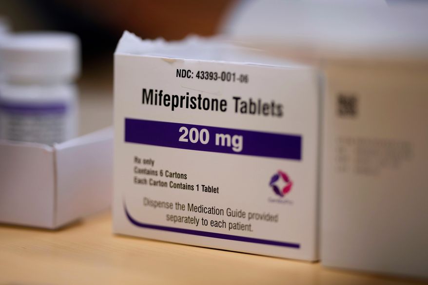 Mifepristone tablets sit on a table at a Planned Parenthood clinic in Ames, Iowa, July 18, 2024. (AP Photo/Charlie Neibergall, File)