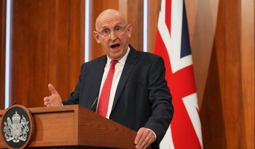 Britain's Defense Secretary John Healey delivers a statement on recent U.K. operational activity at 9 Downing St., in London, Thursday April 9, 2026. (Yui Mok/Pool Photo via AP) ** FILE **