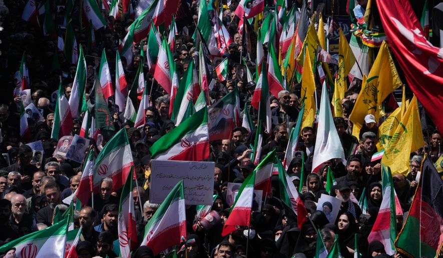 Government supporters gather to mark the 40th day since the death of Supreme Leader Ayatollah Ali Khamenei in Tehran, Iran, Thursday, April 9, 2026. (AP Photo/Vahid Salemi)