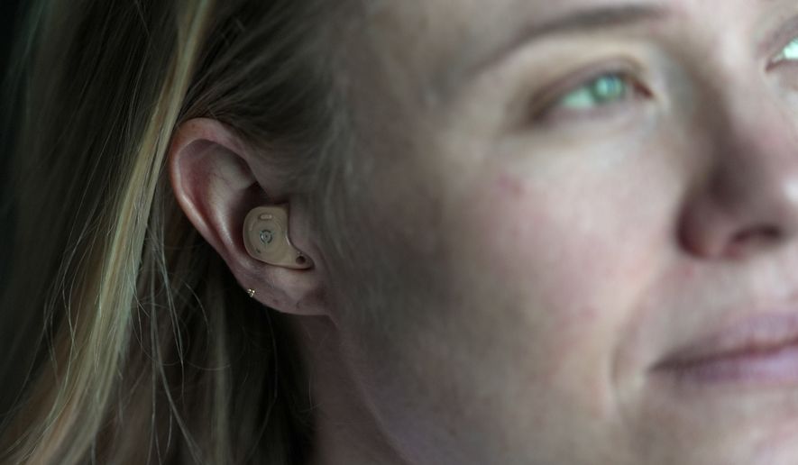 Sara Mearns, principal dancer at New York City Ballet, wearing hearing aids on March 17, 2026, in New York. (AP Photo/Shelby Lum)