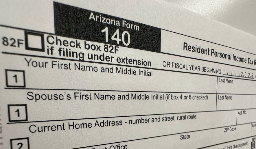 An Arizona state personal income tax form is shown Tuesday, April 7, 2026, in Jefferson City, Mo. (AP Photo/David A. Lieb)