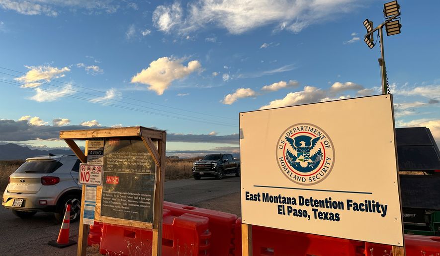 FILE - A sign marks the entrance to a series of hardened tents at the Camp East Montana immigrant detention center in the desert at a U.S. Army base on the outskirts of El Paso, Texas, Feb. 13, 2026. (AP Photo/Morgan Lee, file)
