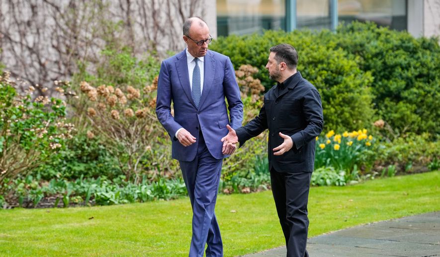 German Chancellor Friedrich Merz welcomes Ukraine's President Volodymyr Zelenskyy for German-Ukrainian government consultations in Berlin, Germany, Tuesday, April 14, 2026. (AP Photo/Ebrahim Noroozi)