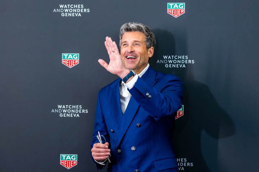 Patrick Dempsey poses for a photocall during the opening day of the "Watches and Wonders Geneva" luxury watch fair, in Geneva, Switzerland, Tuesday, April 14, 2026. (Salvatore Di Nolfi/Keystone via AP)