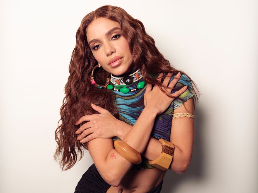Anitta poses for a portrait in New York on Thursday, April, 9, 2026. (Photo by Drew Gurian/Invision/AP)
