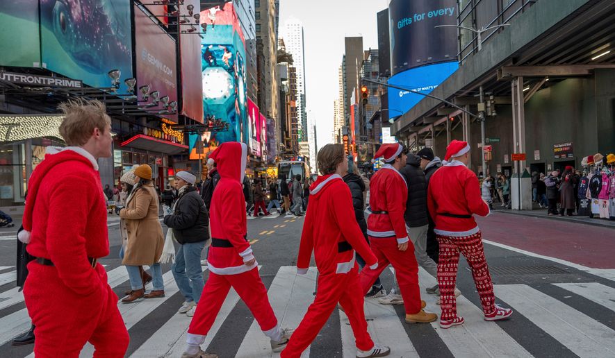 Revelers take part in SantaCon, Dec. 14, 2024, in New York. (AP Photo/Julia Demaree Nikhinson, File)