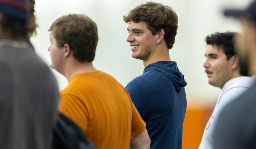 Texas quarterback Arch Manning attends the school's NFL football pro day as a spectator, Tuesday, March 24, 2026, in Austin, Texas. (AP Photo/Stephen Spillman)