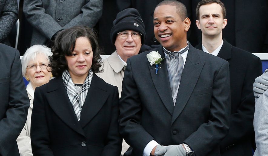 FILE - Lt. Gov. Justin Fairfax, right, and his wife, Cerina, at the inauguration of Gov. Ralph Northam at the Capitol in Richmond, Va., Saturday, Sept. 13, 2018. (AP Photo/Kevin Morley, File)