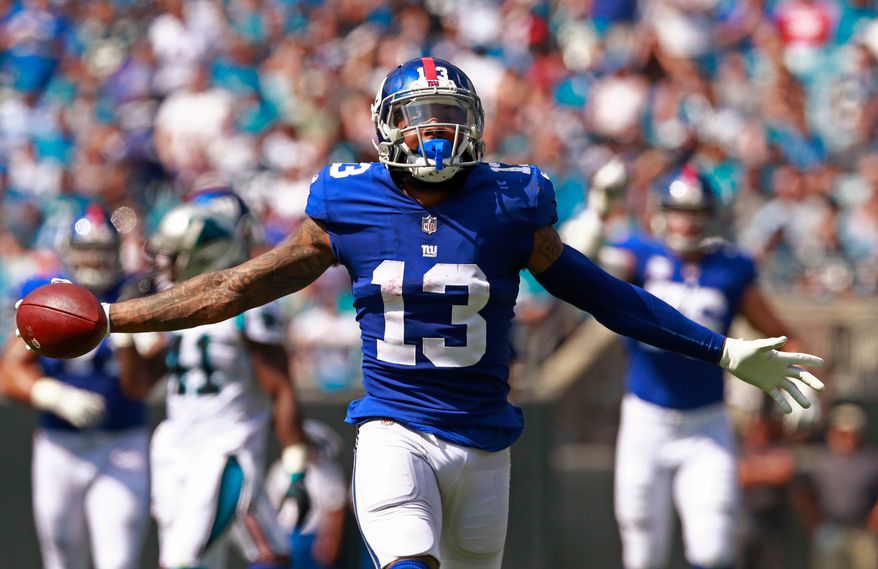 New York Giants' Odell Beckham Jr. celebrates a catch against the Carolina Panthers during the first half of an NFL football game Oct. 7, 2018, in Charlotte, N.C. (AP Photo/Jason E. Miczek) **FILE**