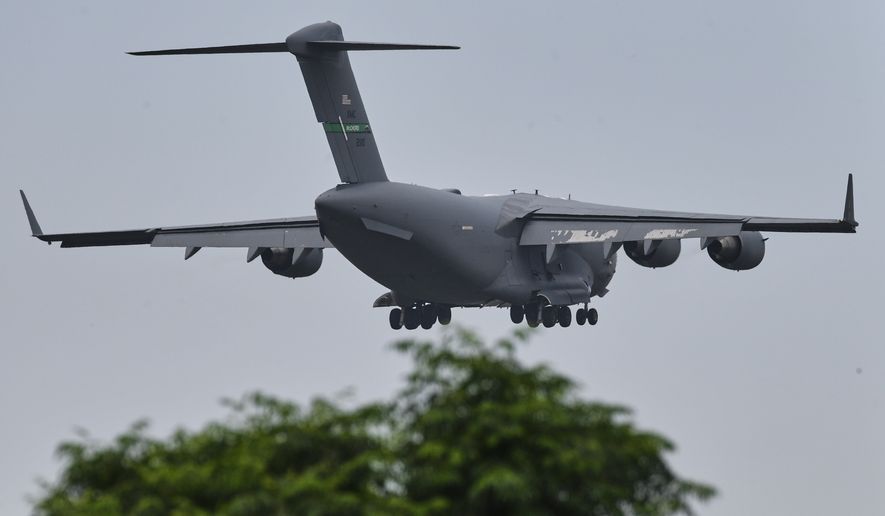 A U.S. Air Force Boeing C-17 Globemaster III transport aircraft prepares to land at Nur Khan airbase, ahead of second round of negotiations between the U.S. and Iran, in Rawalpindi, Pakistan, Monday, April 20, 2026. (AP Photo/Ehsan Shahzad) **FILE**