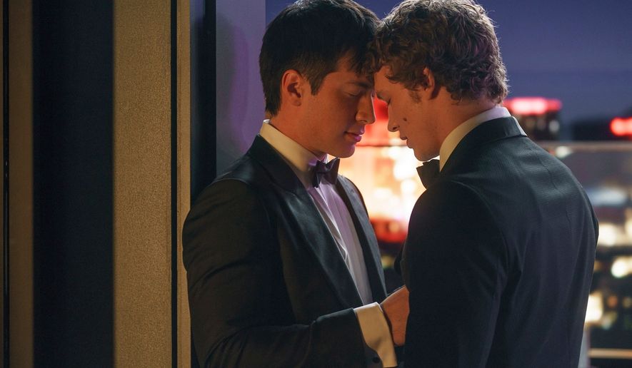 This image released by HBO Max shows Hudson Williams, left, and Connor Storrie in a scene from the series "Heated Rivalry." (Sabrina Lantos/HBO Max via AP)