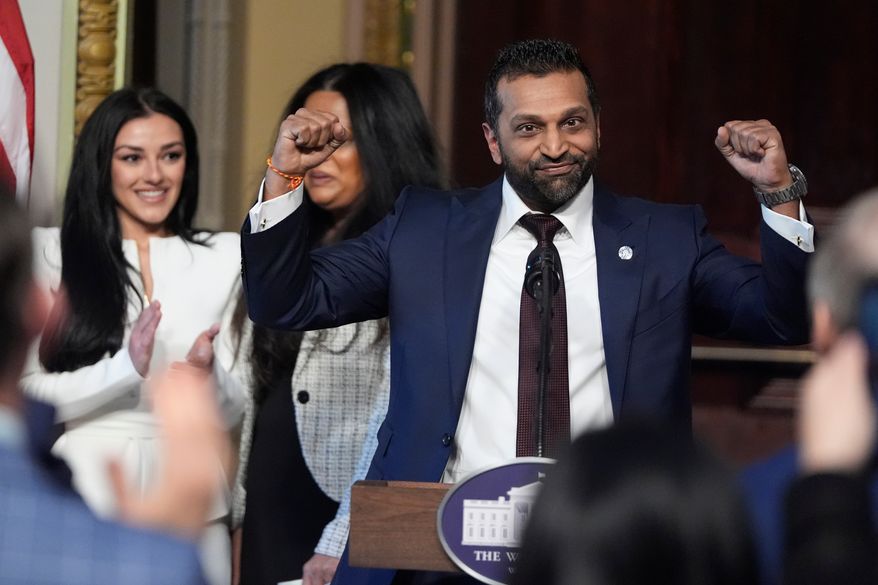 Kash Patel, President Donald Trump's new director of the FBI, reacts as Alexis Wilkins watches during Patel's ceremonial swearing-in, Friday, Feb. 21, 2025, in the Indian Treaty Room at the Eisenhower Executive Office Building on the White House campus, in Washington. (AP Photo/Mark Schiefelbein, File)