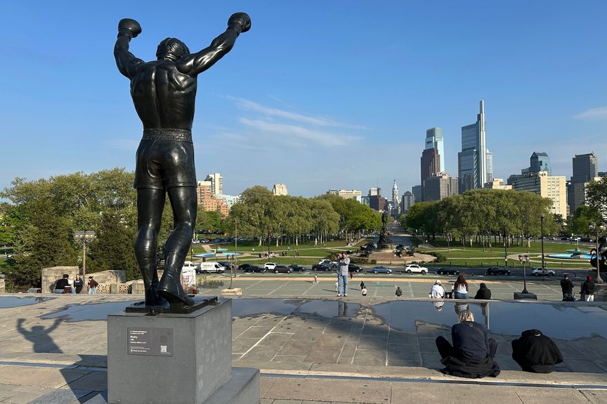 The Rocky statue overlooks the city skyline outside the Philadelphia Museum of Art in Philadelphia, Wednesday, April 22, 2026. (AP Photo/Tassanee Vejpongsa) ** FILE **