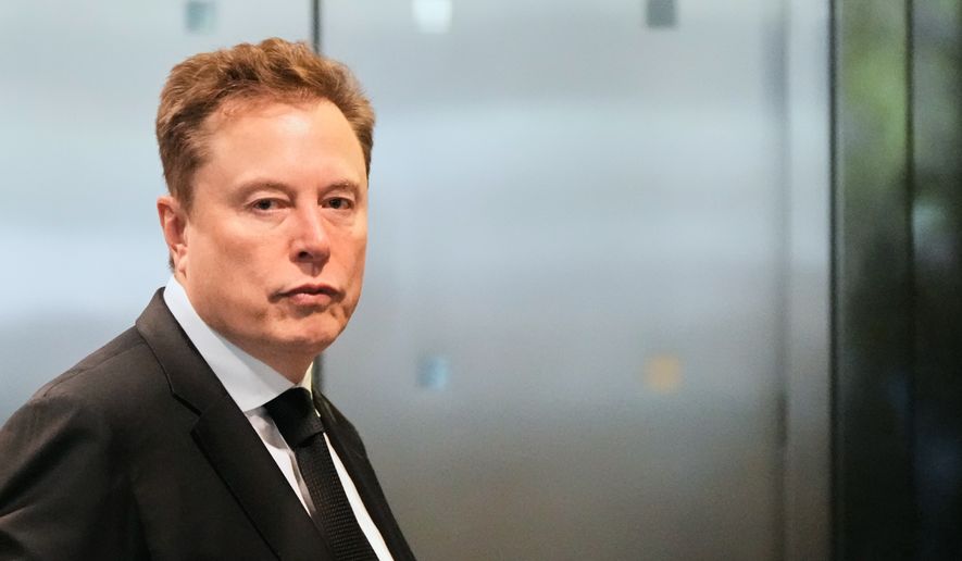 Elon Musk arrives at the U.S. District Court in Oakland, Calif., Tuesday, April 28, 2026. (AP Photo/Godofredo A. Vásquez)