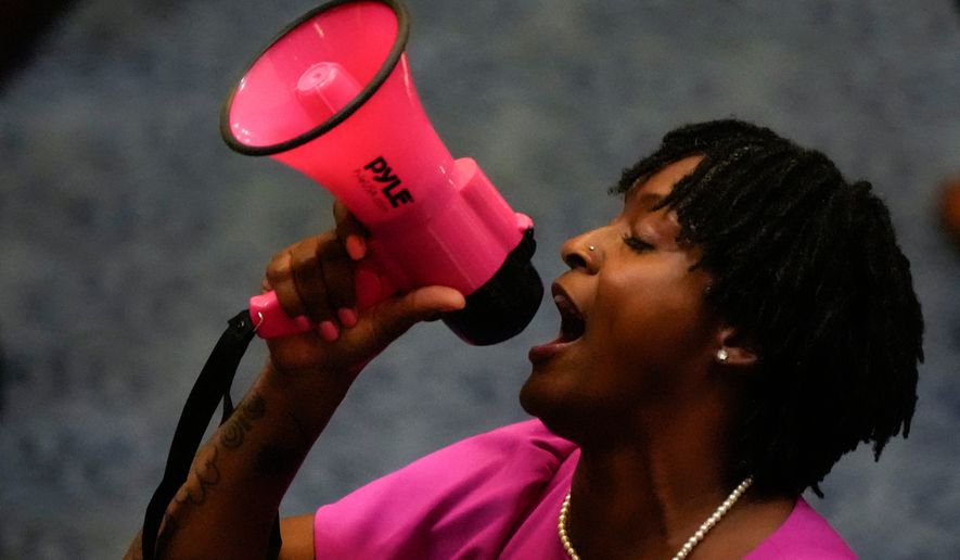 State Rep. Angie Nixon, D-Fla., speaks loudly on the House floor as the House voted on HB1D, a redistricting bill, during a special session of the Florida Legislature, Wednesday, April 29, 2026, in Tallahassee, Fla. (AP Photo/Mike Stewart) ** FILE **