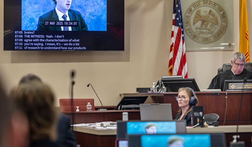 FILE - A recording of Meta Founder and CEO Mark Zuckerberg's deposition is played for the jurors on March 4, 2026, in Santa Fe, N.M. (Jim Weber/Santa Fe New Mexican via AP, Pool, File)