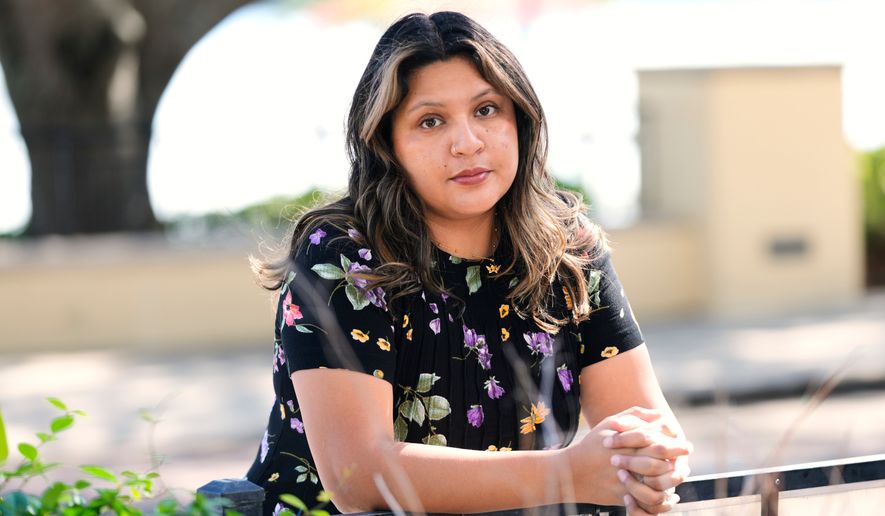 Melani Candia, whose DACA status has lapsed, at a neighborhood in Orlando, Fla., on April 23, 2026. (AP Photo/John Raoux)