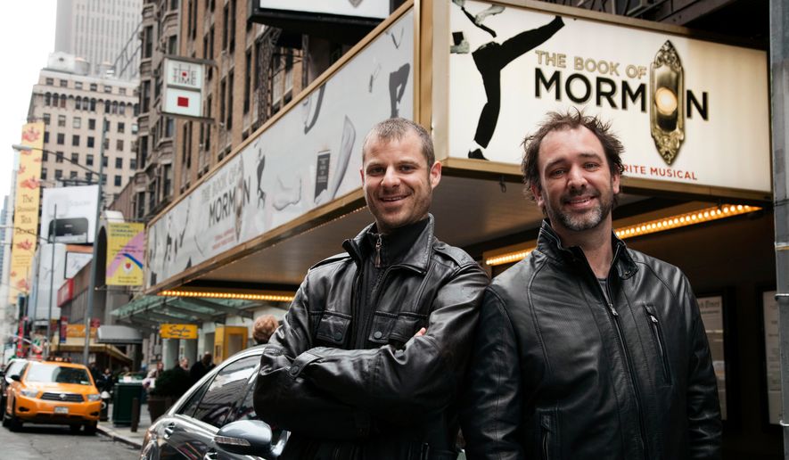 In this March 16, 2011 photo, Trey Parker, right, and Matt Stone, co-creators of the Broadway show "The Book of Mormon," pose for a portrait outside the Eugene O'Neill Theatre in New York. (AP Photo/Victoria Will, file)