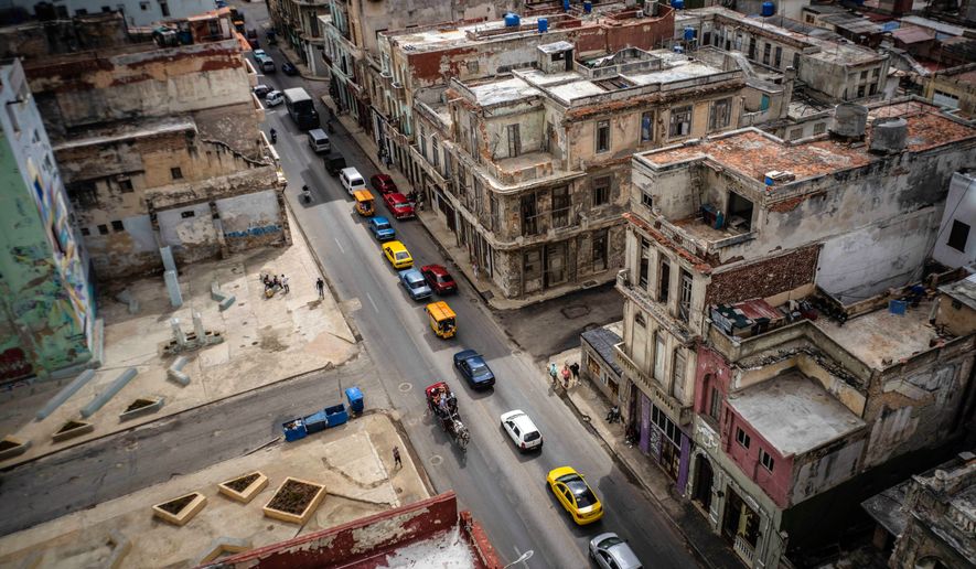 FILE - View of San Lazaro street in Havana, Cuba, Tuesday, March 21, 2023. (AP Photo/Ramon Espinosa, File)