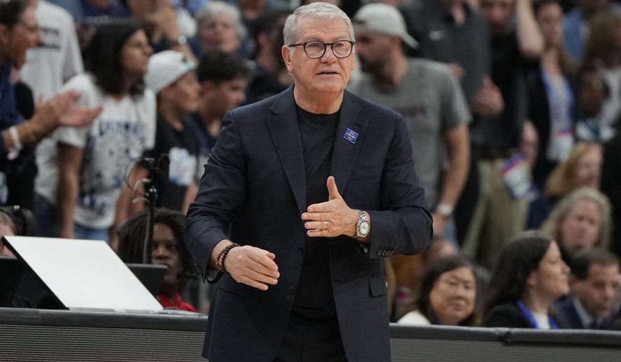 FILE - UConn head coach Geno Auriemma against South Carolina during the first half of a woman's NCAA college basketball tournament semifinal game at the Final Four, April 3, 2026, in Phoenix. (AP Photo/Rick Scuteri, file)
