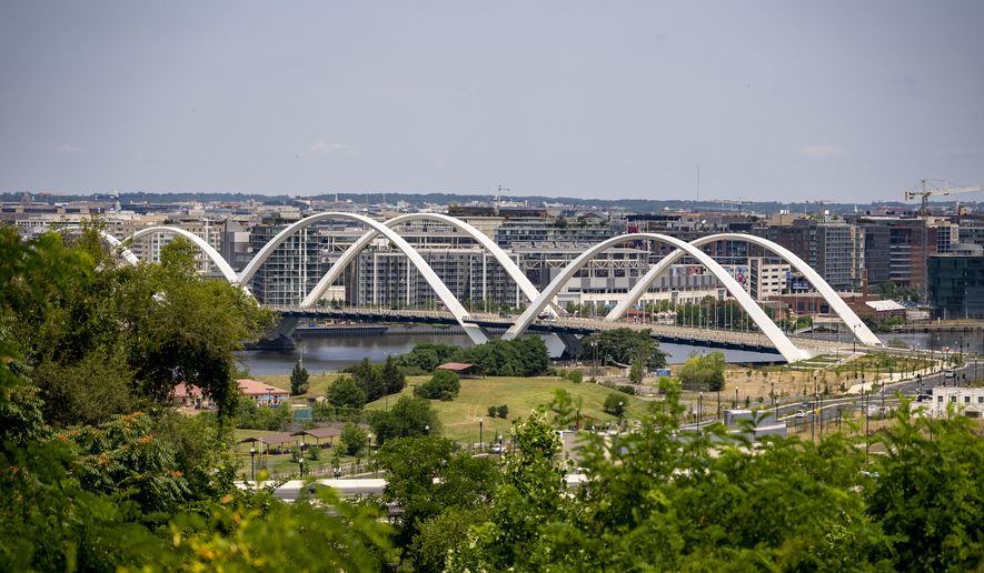 The newly rebuilt Frederick Douglass Memorial Bridge across the Anacostia River is visible from the Department of Homeland Security's St. Elizabeths Campus in Washington, Thursday, June 15, 2023. (AP Photo/Andrew Harnik) **FILE**
