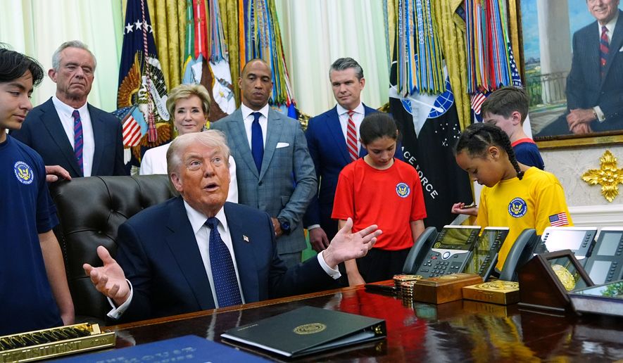 President Donald Trump speaks before signing a proclamation in the Oval Office at the White House, Tuesday, May 5, 2026, in Washington. (AP Photo/Jacquelyn Martin)