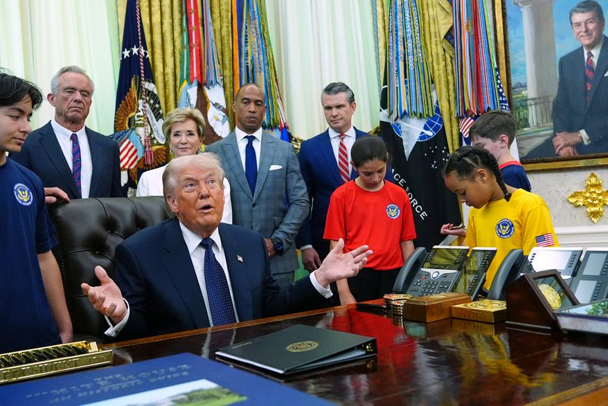 President Donald Trump speaks before signing a proclamation in the Oval Office at the White House, Tuesday, May 5, 2026, in Washington. (AP Photo/Jacquelyn Martin)