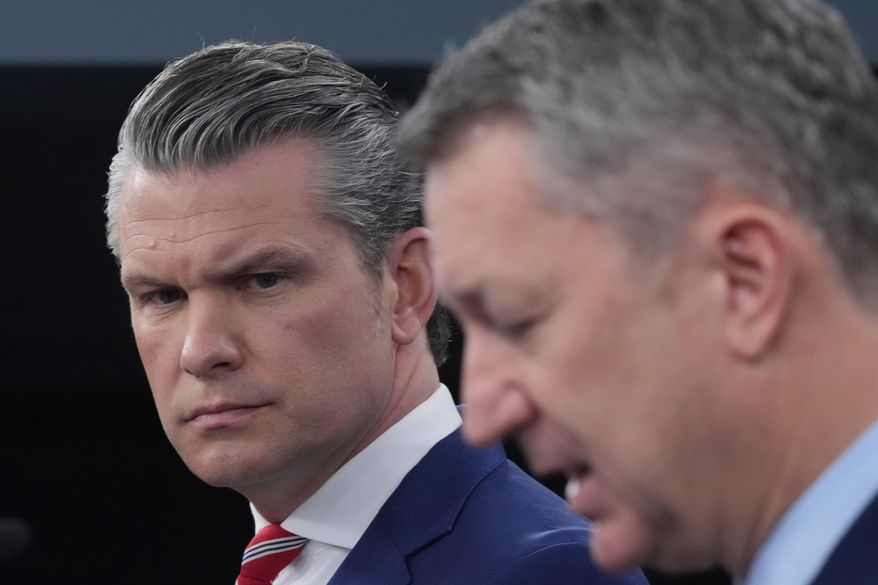 Defense Secretary Pete Hegseth and Chairman of the Joint Chiefs of Staff Gen. Dan Caine speak to members of the media during a press briefing at the Pentagon in Washington on Tuesday, May 5, 2026. (AP Photo/Manuel Balce Ceneta)