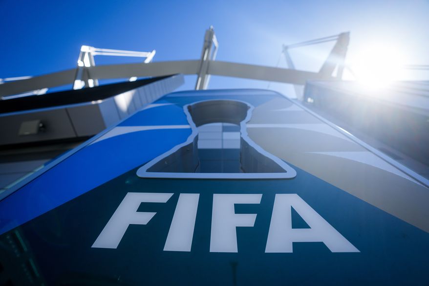 The FIFA logo is displayed on a World Cup countdown timer outside BC Place stadium in Vancouver, British Columbia, Monday, May 4, 2026. (Darryl Dyck/The Canadian Press via AP)