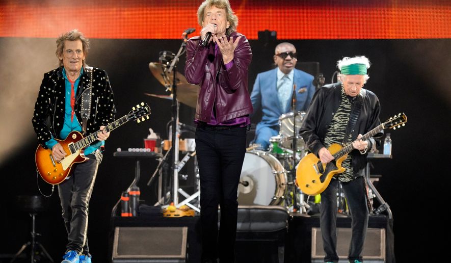 Ronnie Wood, from left, Mick Jagger, Steve Jordan, and Keith Richards of The Rolling Stones perform during the "Hackney Diamonds" tour on June 27, 2024, in Chicago. (Photo by Rob Grabowski/Invision/AP, File)