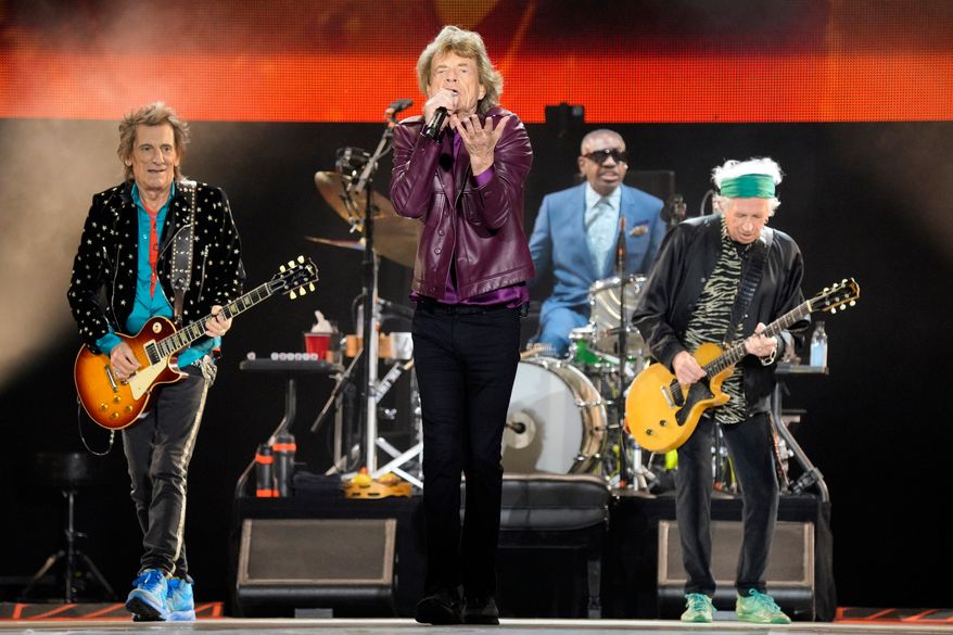 Ronnie Wood, from left, Mick Jagger, Steve Jordan, and Keith Richards of The Rolling Stones perform during the "Hackney Diamonds" tour on June 27, 2024, in Chicago. (Photo by Rob Grabowski/Invision/AP, File)