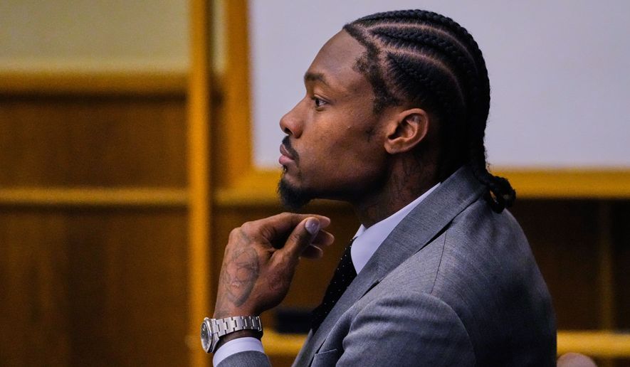 Former New England Patriots wide receiver Stefon Diggs appears in court during his trial at Norfolk County District Court, Tuesday, May 5, 2026, in Dedham, Mass. (AP Photo/Charles Krupa, Pool)