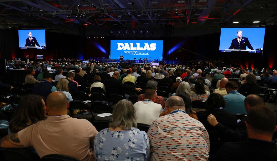 Messengers attending the Southern Baptist Convention listen to remarks by president Clint Pressley during the 2025 SBC Annual Meeting, June 10, 2025, in Dallas. (AP Photo/Richard W. Rodriguez, File)
