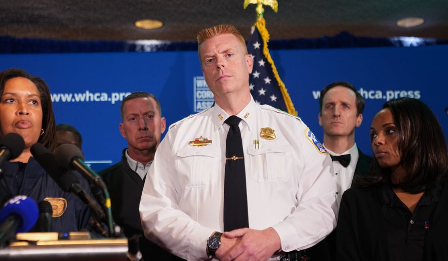 Interim Chief of Police of the Metropolitan Police Department listens during a press conference following a shooting at the White House Correspondents' Association Dinner in Washington, Saturday, April 25, 2026. (AP Photo/Allison Robbert)