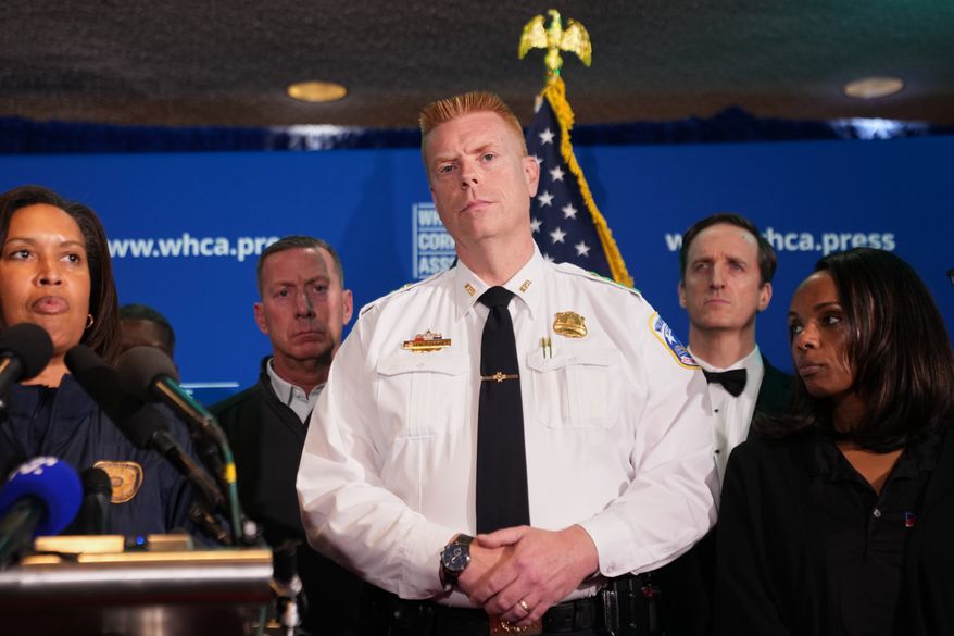 Interim Chief of Police of the Metropolitan Police Department listens during a press conference following a shooting at the White House Correspondents' Association Dinner in Washington, Saturday, April 25, 2026. (AP Photo/Allison Robbert)