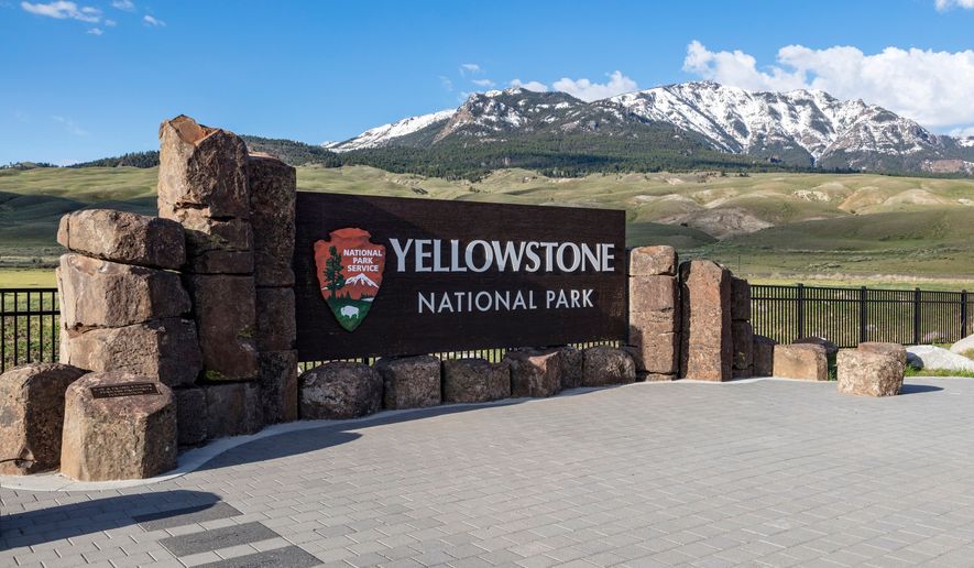 This photo provided by the National Park Service shows a sign marking the north entrance of Yellowstone National Park on May 7, 2018. (Jacob W. Frank/National Park Service via AP) ** FILE **