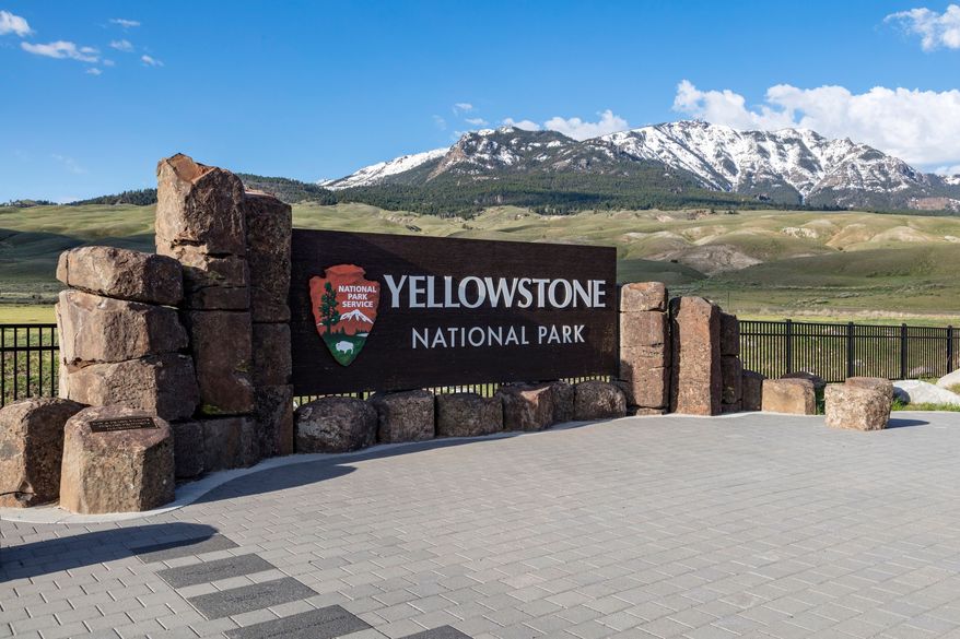 This photo provided by the National Park Service shows a sign marking the north entrance of Yellowstone National Park on May 7, 2018. (Jacob W. Frank/National Park Service via AP) **FILE**