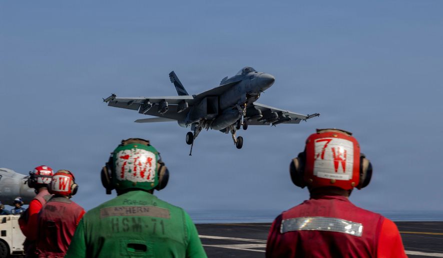 This image provided by U.S. Central Command shows a F/A-18E Super Hornet preparing to make an arrested landing on the USS Abraham Lincoln (CVN 72) in support of Operation Epic Fury on Monday, March 2, 2026. (U.S. Navy via AP) ** FILE **