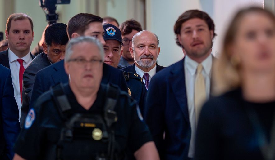 Commerce Secretary Howard Lutnick arrives for a deposition as part of the House Oversight Committee's investigation of convicted sex offender Jeffrey Epstein, at the Capitol in Washington, Wednesday, May 6, 2026. (AP Photo/J. Scott Applewhite)