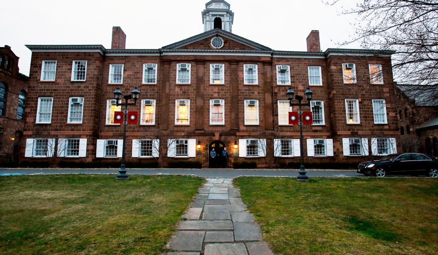 Lights glow in Rutgers University's Old Queens building, April 4, 2013, in New Brunswick, N.J. (AP Photo/Mel Evans, File)