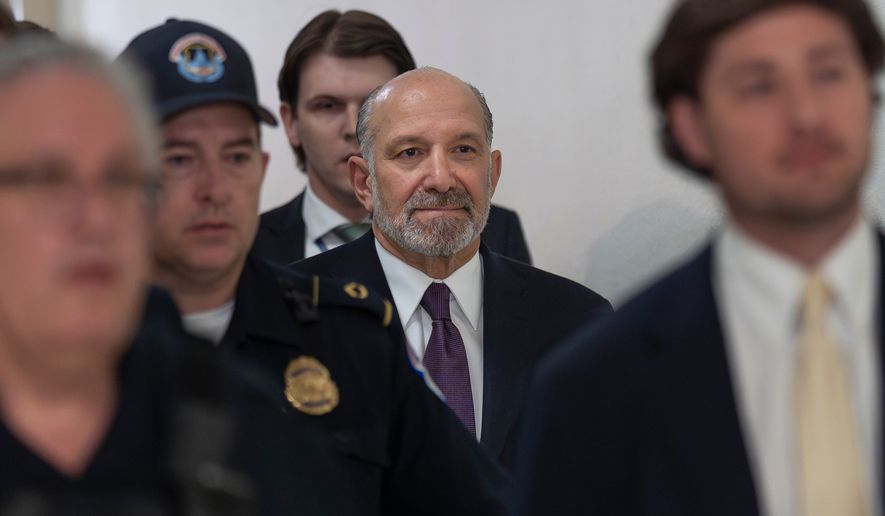 Commerce Secretary Howard Lutnick arrives for a deposition as part of the House Oversight Committee's investigation of convicted sex offender Jeffrey Epstein, at the Capitol in Washington, Wednesday, May 6, 2026. (AP Photo/J. Scott Applewhite)