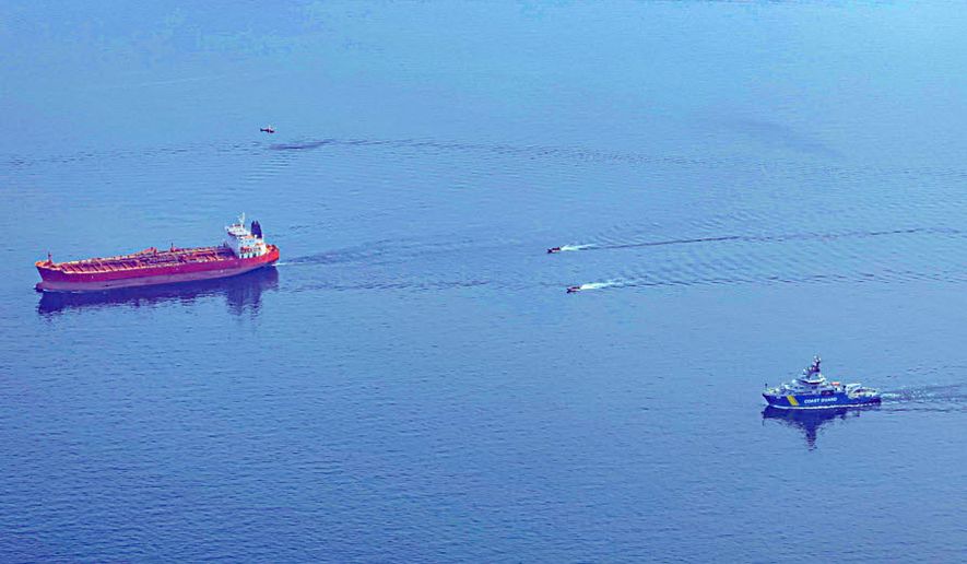 The Swedish Coast Guard, together with Swedish Police, boards the Jin Hui, a tanker sailing under a suspected false flag in the Baltic Sea, Sunday, May 3, 2026. (Swedish Coast Guard via AP)