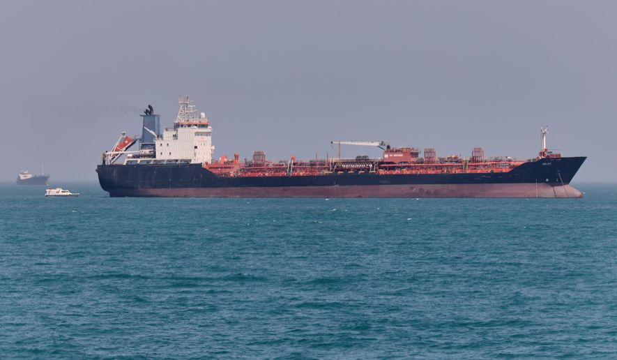 An oil tanker sits at anchor in the Strait of Hormuz off Bandar Abbas, Iran, Saturday, May 2, 2026.(Amirhosein Khorgooi/ISNA via AP)