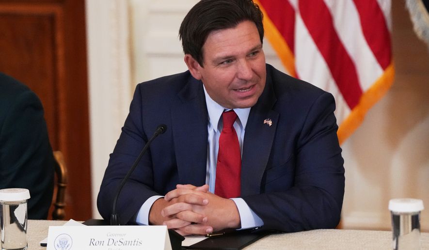 FILE - Florida Gov. Ron DeSantis is seen before a roundtable discussion on college sports in the East Room of the White House, March 6, 2026, in Washington. (AP Photo/Julia Demaree Nikhinson, File)