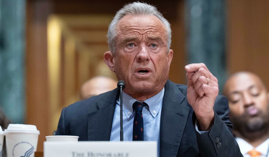 Health and Human Services Secretary Robert F. Kennedy Jr. testifies before a Senate Committee on Finance hearing on Capitol Hill, Wednesday, April 22, 2026, in Washington. (AP Photo/Jose Luis Magana)