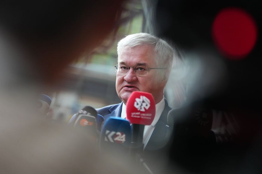 Ukraine's Foreign Minister Andrii Sybiha speaks with the media as he arrives for a meeting of EU foreign ministers at the European Council building in Brussels, Monday, May 11, 2026. (AP Photo/Virginia Mayo)
