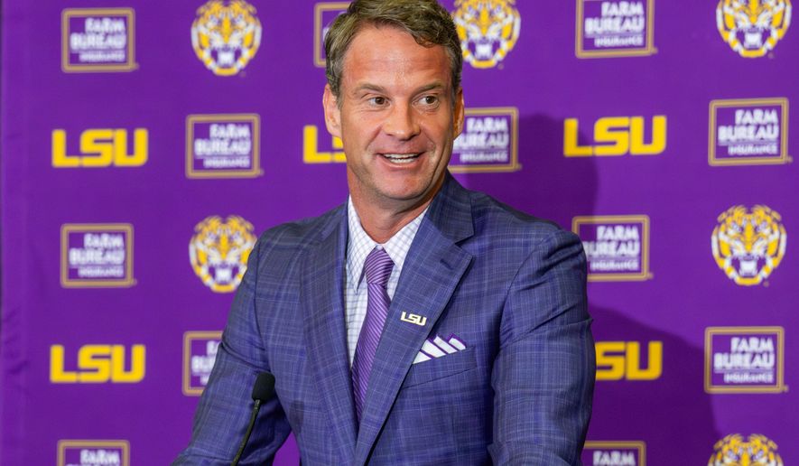 FILE - LSU's new head football coach Lane Kiffin gives an opening statement at an introductory news conference, Dec. 1, 2025, in Baton Rouge, La. (Michael Johnson/The Advocate via AP, File)