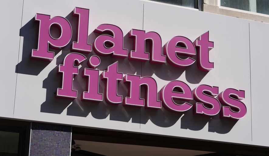 A Planet Fitness sign is seen at one of their fitness centers, Thursday, March 14, 2024, in Boston. (AP Photo/Michael Dwyer)