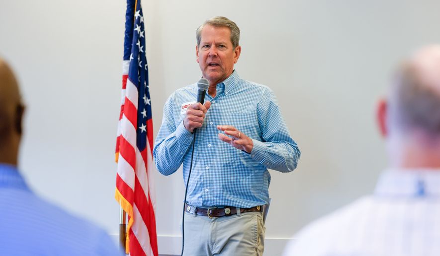Gov. Brian Kemp speaks during a campaign stop for Republican U.S. Senate candidate Derek Dooley at Farmview Market in Madison, Ga., on May 8, 2026. (Arvin Temkar/Atlanta Journal-Constitution via AP)